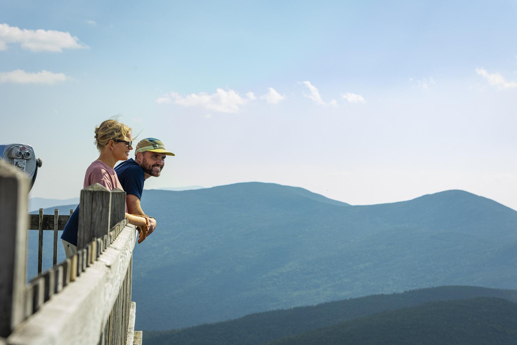 Couple on the summit enjoying the view